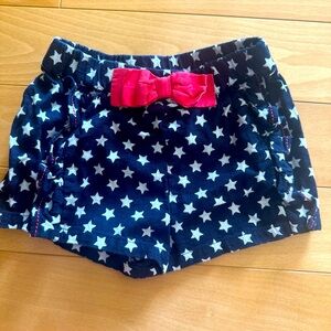 Star Patterned Shorts with Red Bow